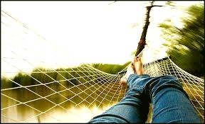  person relaxing in a hammock 